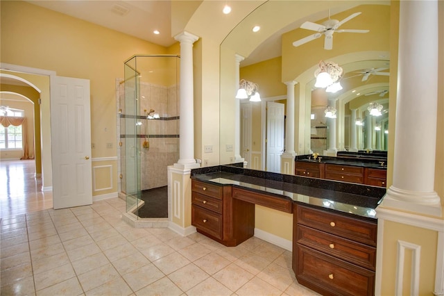 full bath with tile patterned flooring, ceiling fan, a stall shower, decorative columns, and recessed lighting