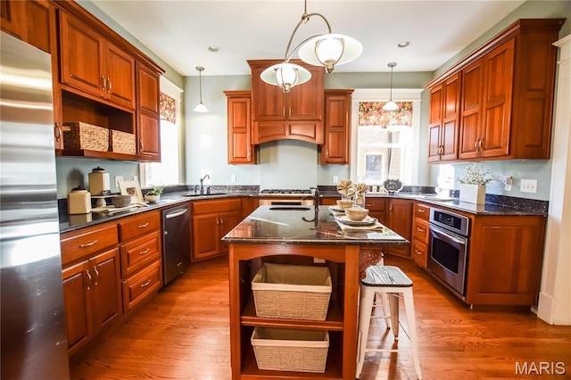 5076 Westminster Pl, Saint Louis, MO 63108 - kitchen with appliances with stainless steel finishes, a sink, open shelves, healthy amount of natural light, and recessed lighting