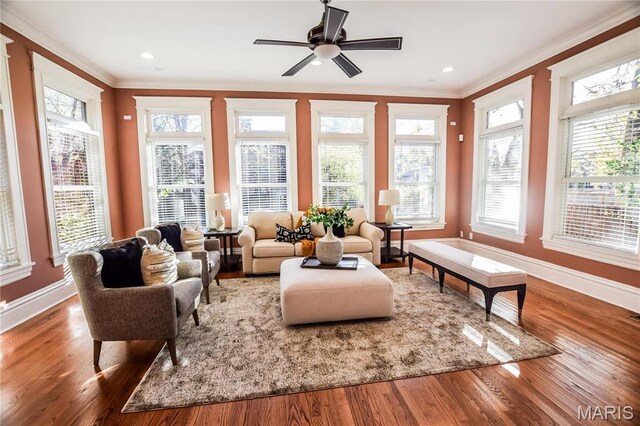 5076 Westminster Pl, Saint Louis, MO 63108 - sunroom with crown molding, plenty of natural light, wood finished floors, baseboards, and recessed lighting