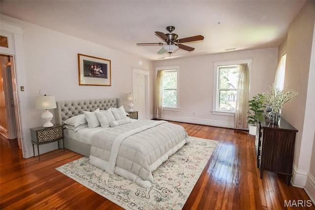5076 Westminster Pl, Saint Louis, MO 63108 - bedroom with hardwood / wood-style flooring, baseboards, and ceiling fan