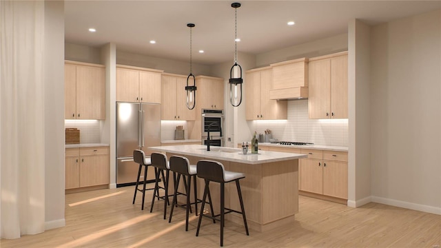 kitchen featuring appliances with stainless steel finishes, light brown cabinetry, custom range hood, tasteful backsplash, and light countertops