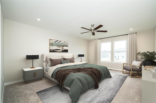 carpeted bedroom featuring baseboards, a ceiling fan, and recessed lighting