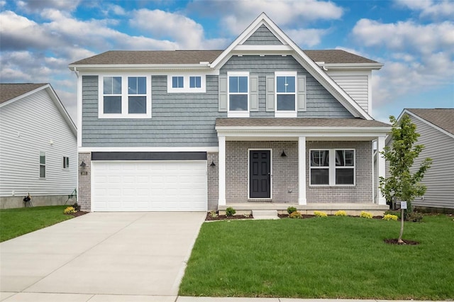 view of front of home with covered porch, concrete driveway, a front lawn, a garage, and brick siding