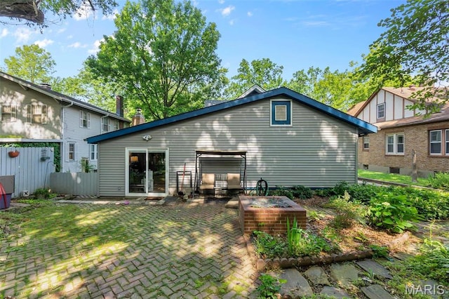 374 N Park Ave, Cape Girardeau, MO 63701 - back of house with a patio area and an outdoor fire pit