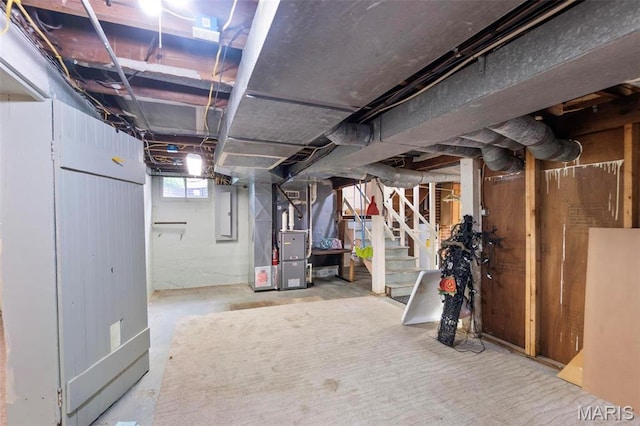 374 N Park Ave, Cape Girardeau, MO 63701 - basement with heating unit, stairs, and electric panel