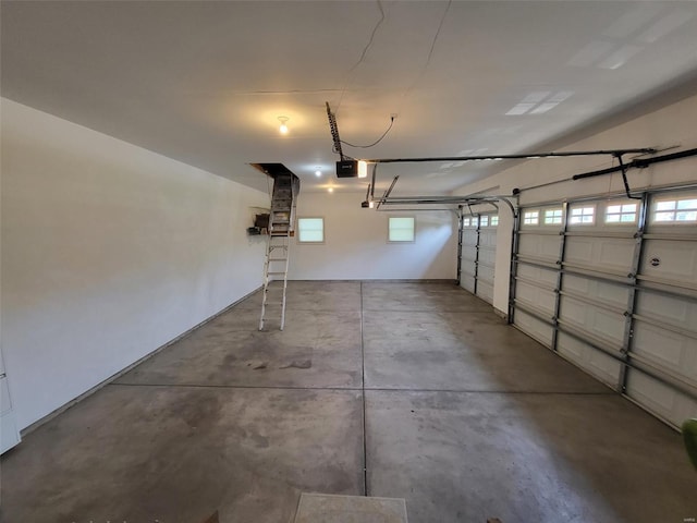 garage featuring a garage door opener