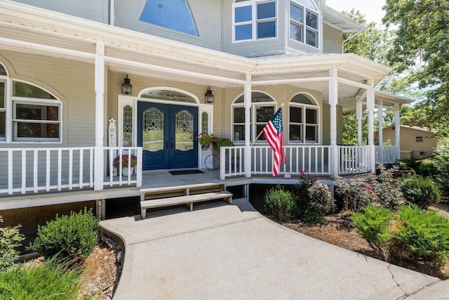 27302 Cimarron Dr, Roaring River Township, MO 65641 - entrance to property featuring covered porch and french doors