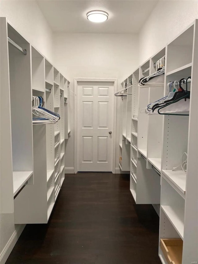 27302 Cimarron Dr, Roaring River Township, MO 65641 - walk in closet with dark wood finished floors