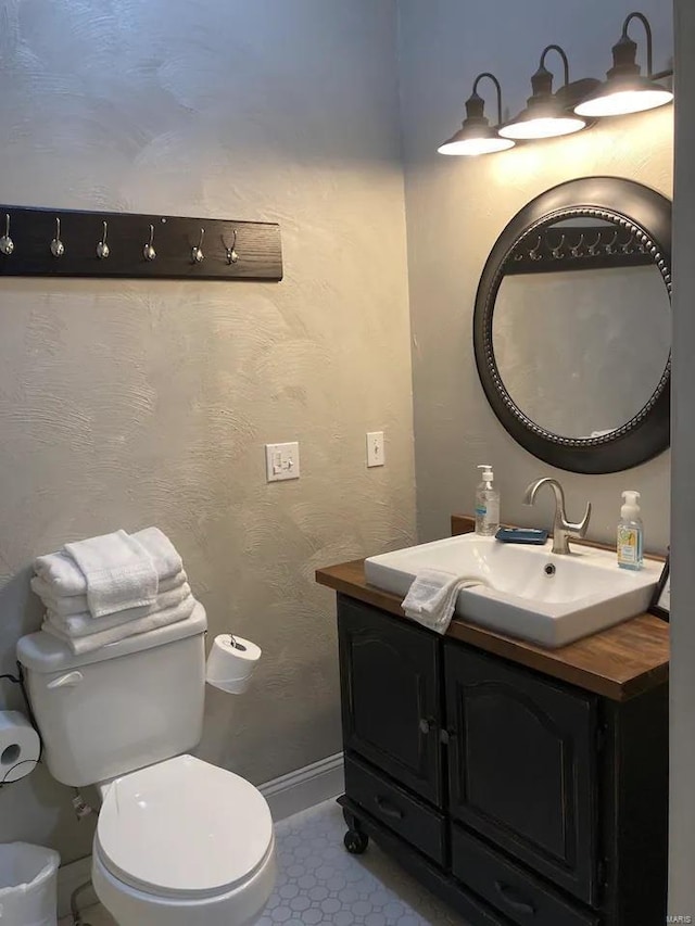 27302 Cimarron Dr, Roaring River Township, MO 65641 - half bathroom with baseboards, toilet, and vanity