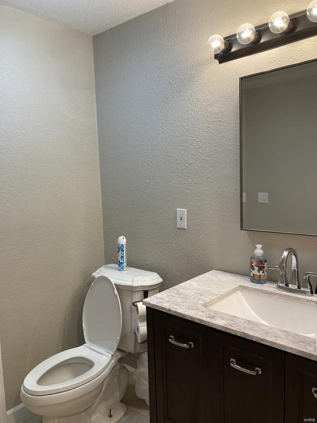 27302 Cimarron Dr, Roaring River Township, MO 65641 - bathroom featuring toilet, vanity, and a textured ceiling