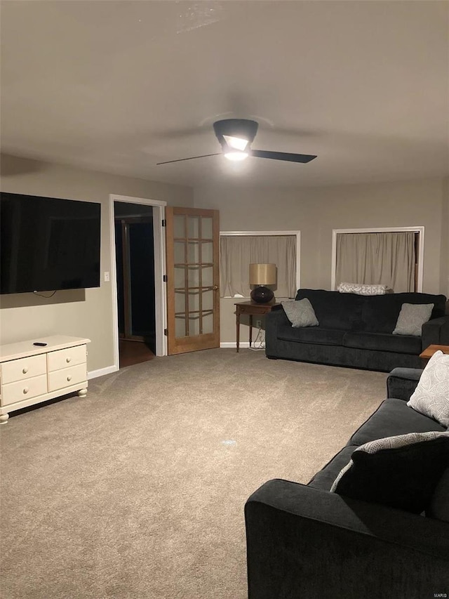 27302 Cimarron Dr, Roaring River Township, MO 65641 - carpeted living area featuring a ceiling fan and baseboards