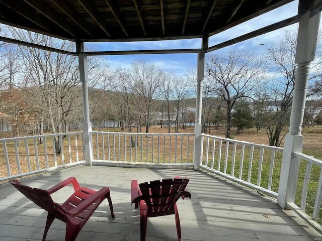 27302 Cimarron Dr, Roaring River Township, MO 65641 - deck with covered porch and view of scattered trees