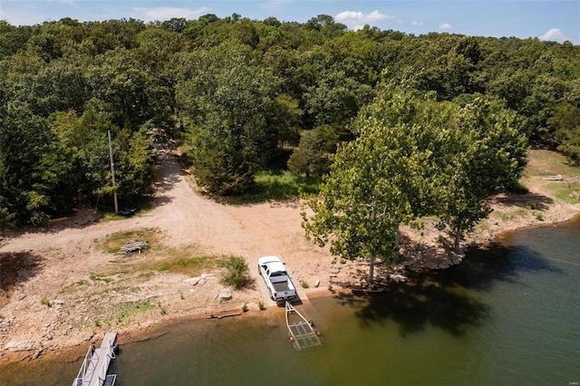 27302 Cimarron Dr, Roaring River Township, MO 65641 - drone / aerial view of a nearby body of water and a heavily wooded area