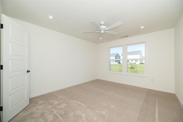 1909 Rolling River Cir, Ofallon, MO 63366 - unfurnished room with light carpet, a ceiling fan, recessed lighting, and baseboards
