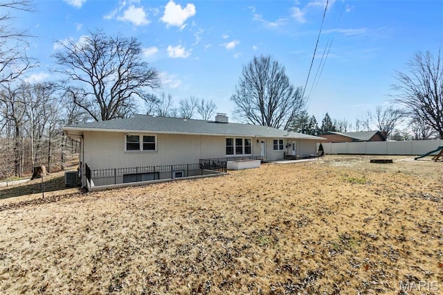 1331 N Cape Rock Dr, Cape Girardeau, MO 63701 - rear view of property with a chimney, fence, brick siding, and a patio