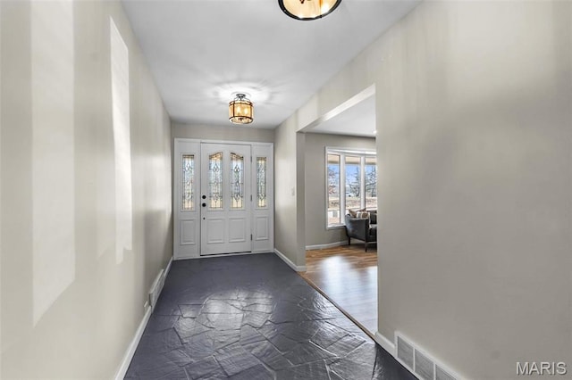1331 N Cape Rock Dr, Cape Girardeau, MO 63701 - entrance foyer featuring baseboards and stone finish flooring