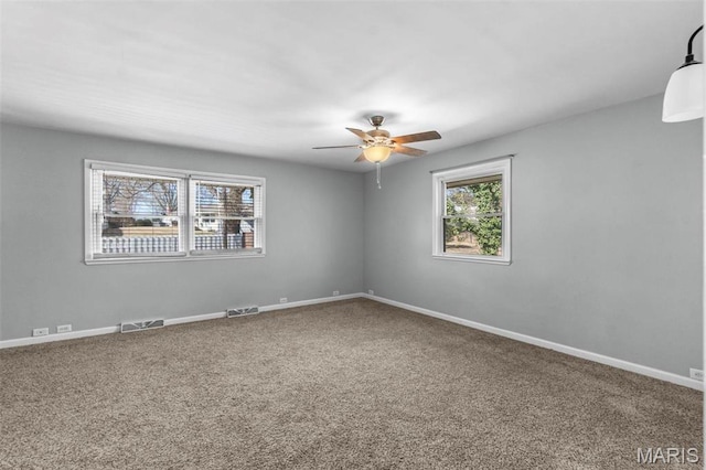 1331 N Cape Rock Dr, Cape Girardeau, MO 63701 - spare room featuring ceiling fan, carpet flooring, and baseboards