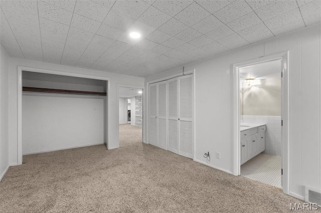 1331 N Cape Rock Dr, Cape Girardeau, MO 63701 - unfurnished bedroom featuring carpet and ensuite bathroom