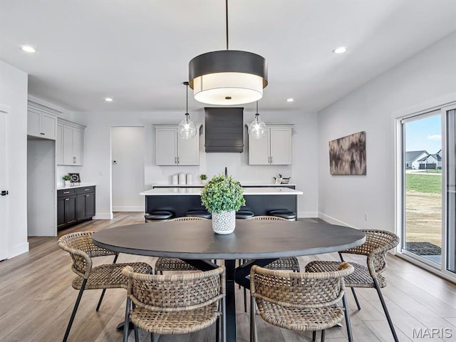 3106 Ashley Dr, Glen Carbon, IL 62034 - dining room with light wood-style flooring, baseboards, and recessed lighting