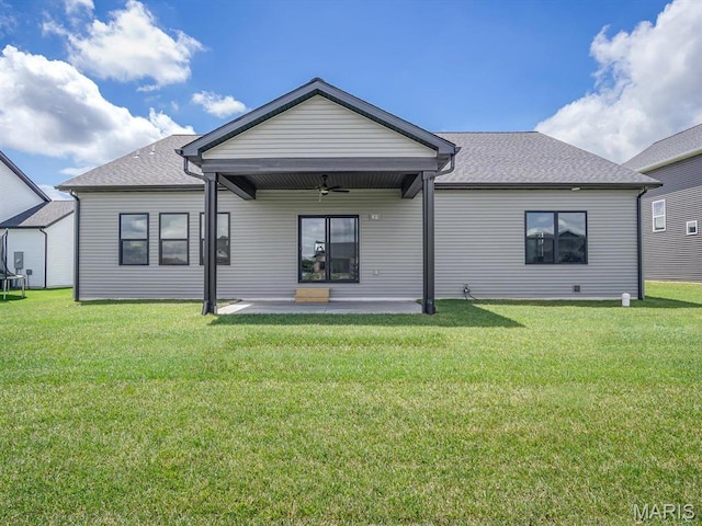 3106 Ashley Dr, Glen Carbon, IL 62034 - rear view of house with a ceiling fan, a patio area, a lawn, and a shingled roof