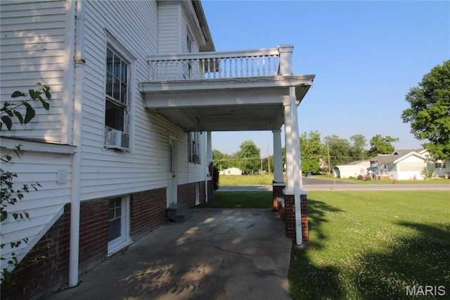 1001 S Main St, Lockwood, MO 65682 - view of home's exterior with a balcony and a yard