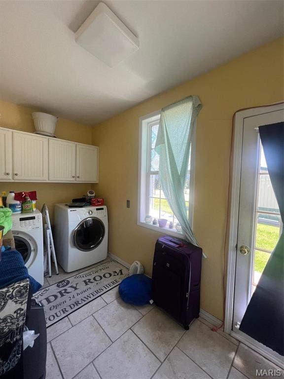 1001 S Main St, Lockwood, MO 65682 - laundry area with separate washer and dryer, cabinet space, and baseboards