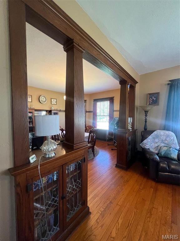 1001 S Main St, Lockwood, MO 65682 - corridor featuring wood-type flooring and decorative columns