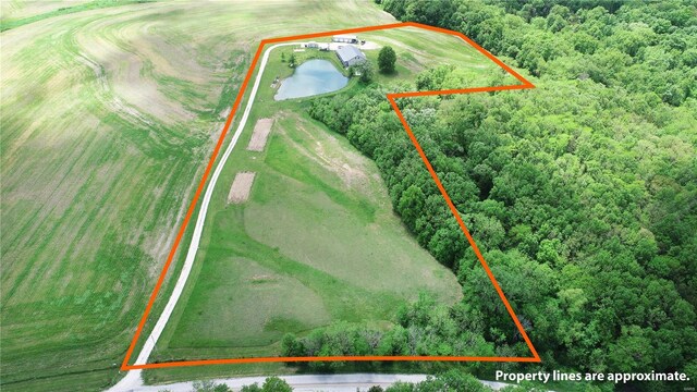 14305 State Highway F, Canton, MO 63435 - aerial overview of property's location with property boundaries highlighted and a heavily wooded area