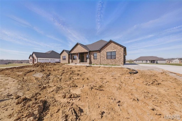 view of front of property featuring brick siding