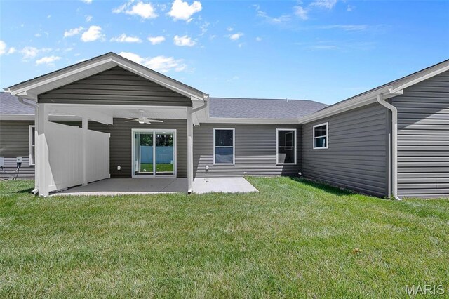 0 Hickory Lndg, De Soto, MO 63020 - back of property with ceiling fan, a patio, a lawn, and a shingled roof