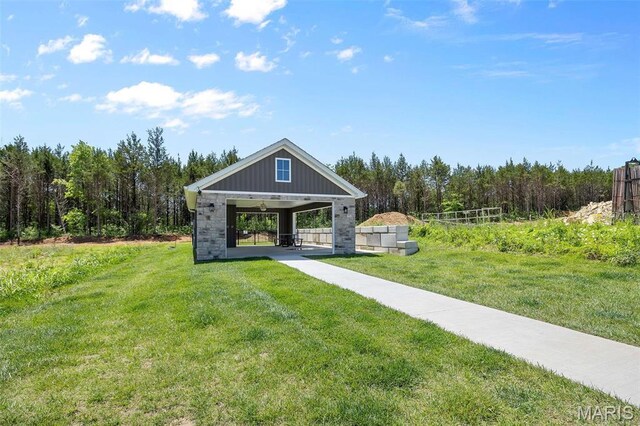 0 Hickory Lndg, De Soto, MO 63020 - view of community featuring a lawn and a wooded view