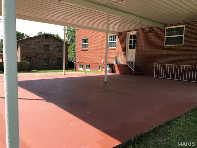 1202 S Gertrude St, Salem, MO 65560 - view of patio / terrace with entry steps and an attached carport