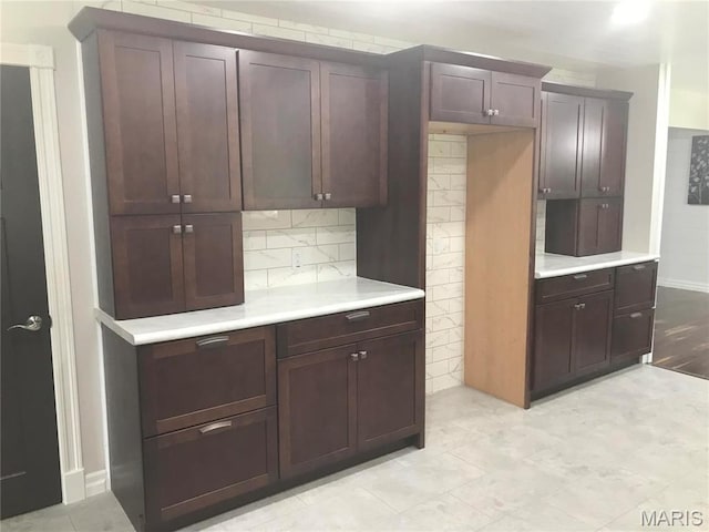 1202 S Gertrude St, Salem, MO 65560 - kitchen with light countertops and backsplash