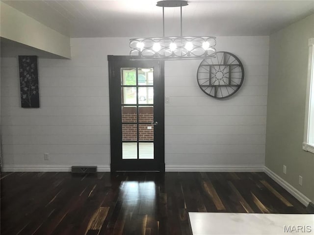 1202 S Gertrude St, Salem, MO 65560 - doorway to outside featuring wood finished floors and a chandelier