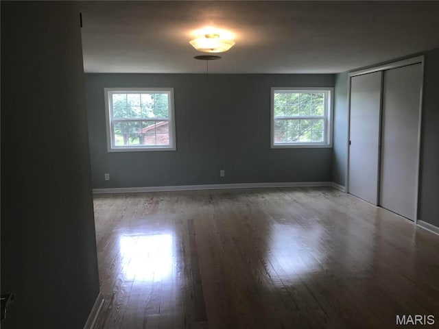 1202 S Gertrude St, Salem, MO 65560 - unfurnished bedroom featuring wood finished floors and a closet
