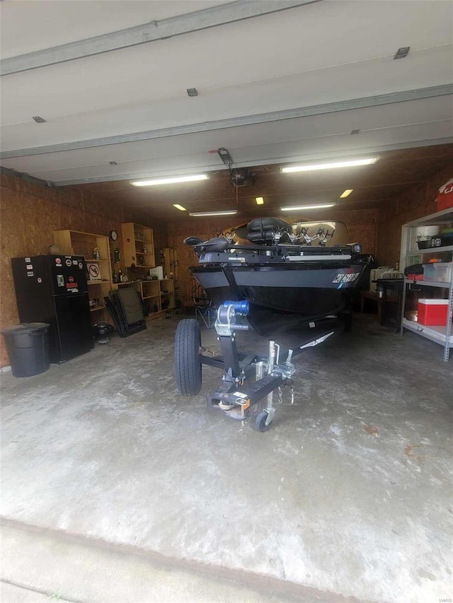 garage featuring freestanding refrigerator