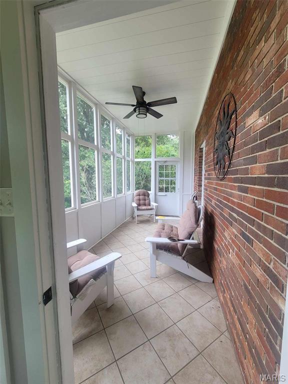 16225 Shady Ln, Dexter, MO 63841 - sunroom with ceiling fan