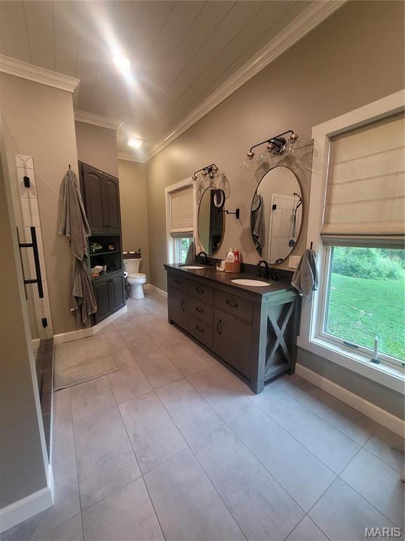 16225 Shady Ln, Dexter, MO 63841 - bathroom with toilet, plenty of natural light, double vanity, crown molding, and tile patterned flooring
