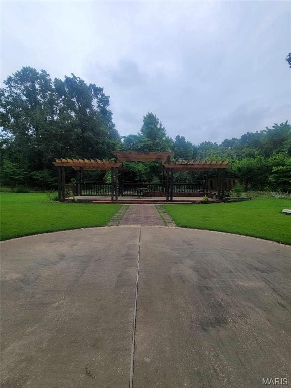 16225 Shady Ln, Dexter, MO 63841 - view of home's community featuring a pergola and a yard