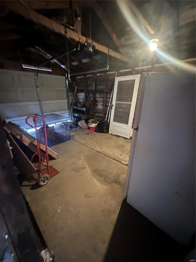 garage with freestanding refrigerator