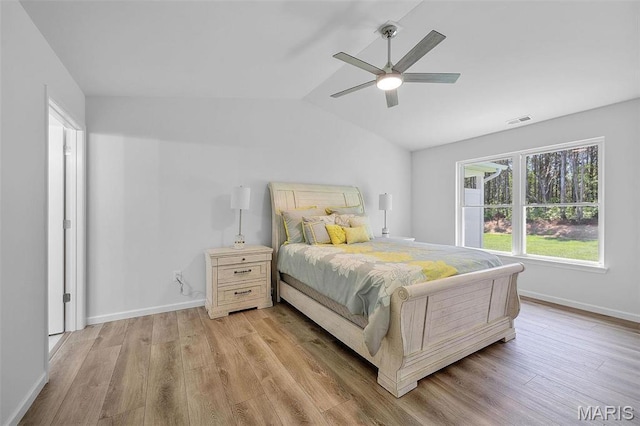 1523 Hickory Lndg, De Soto, MO 63020 - bedroom featuring vaulted ceiling, light wood finished floors, a ceiling fan, and baseboards