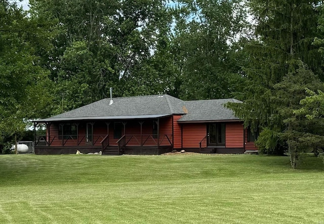 9002 Lumbert Ln, Lebanon, IL 62254 - back of property with a porch, a yard, and a shingled roof