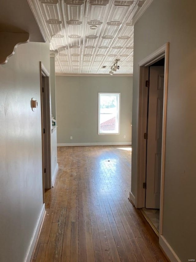 13 N Division St, Duquoin, IL 62832 - hallway with hardwood / wood-style floors, baseboards, an ornate ceiling, and crown molding