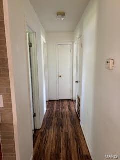 507 S Railroad, Matthews, MO 63867 - hallway featuring wood finished floors and baseboards