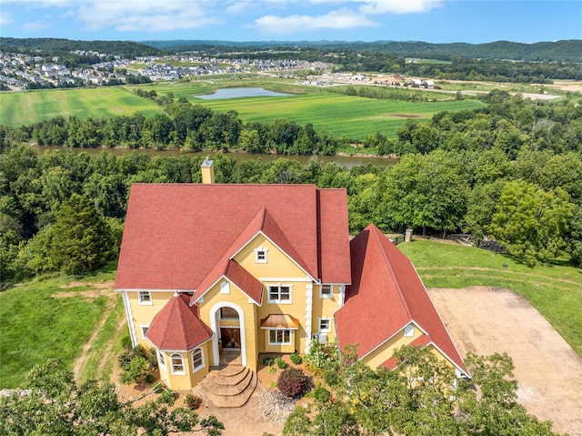 view from above of property with a large body of water