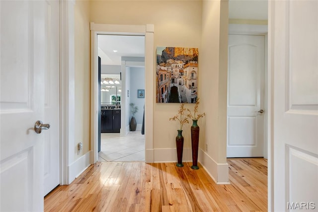 265 Deer Run Ln, Eureka, MO 63025 - hallway featuring wood-type flooring and baseboards