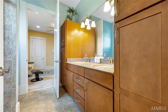 265 Deer Run Ln, Eureka, MO 63025 - bathroom with double vanity, ceiling fan, and tile patterned flooring