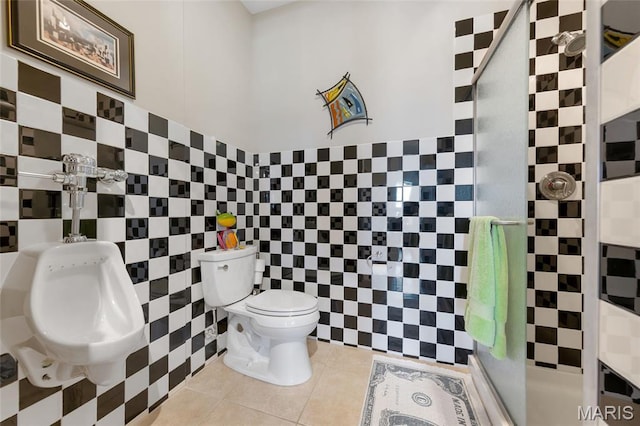 265 Deer Run Ln, Eureka, MO 63025 - bathroom with toilet, tile walls, a tile shower, and tile patterned flooring