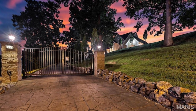 265 Deer Run Ln, Eureka, MO 63025 - gate at dusk with a yard