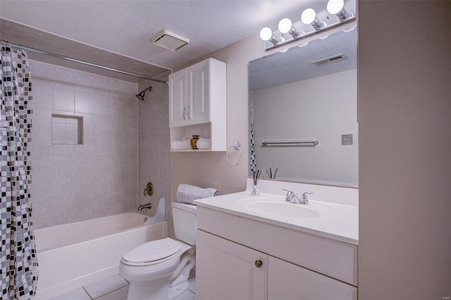 full bath featuring toilet, vanity, tile patterned floors, shower / tub combo with curtain, and a textured ceiling